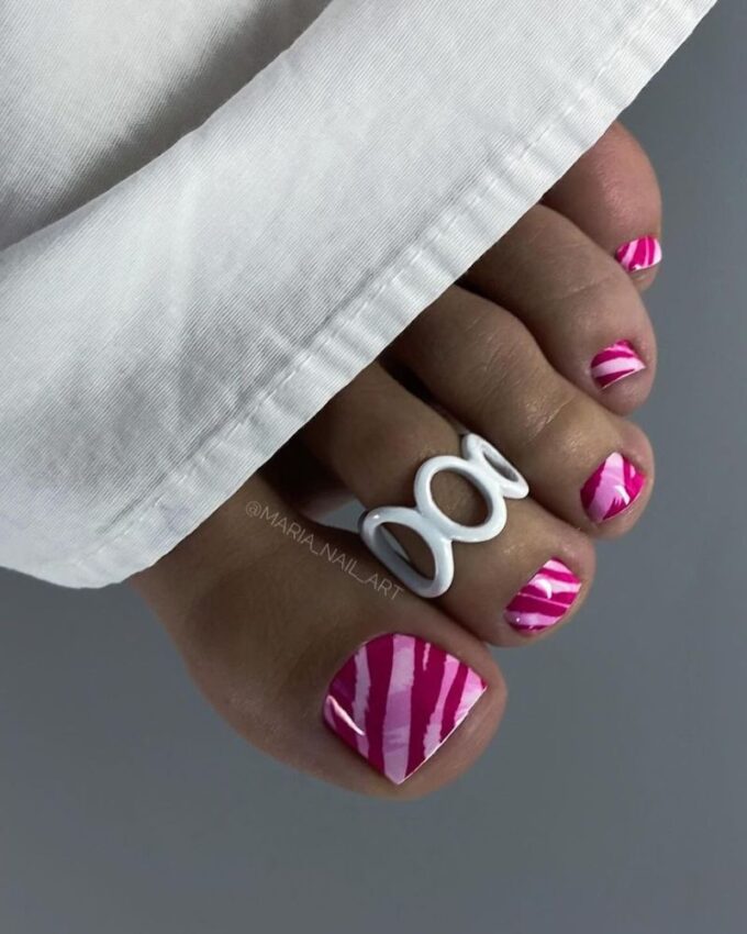 Designs d'ongles de pieds pour l'été